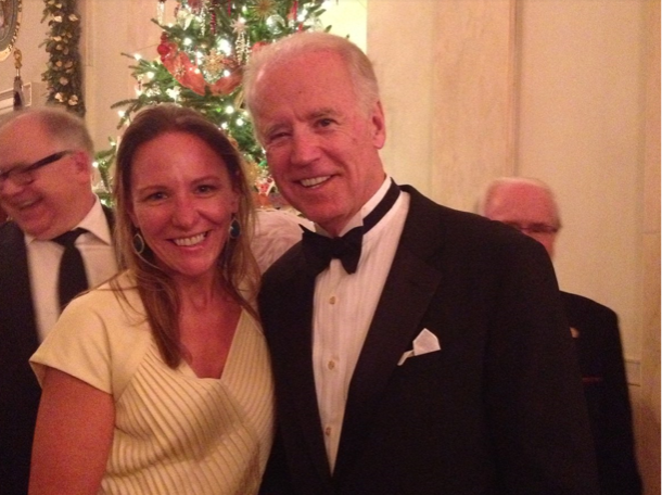 Elizabeth Glidden Peluso with President Biden at the White House Christmas Party